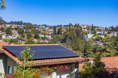 Residential home with solar panels installed on the roof